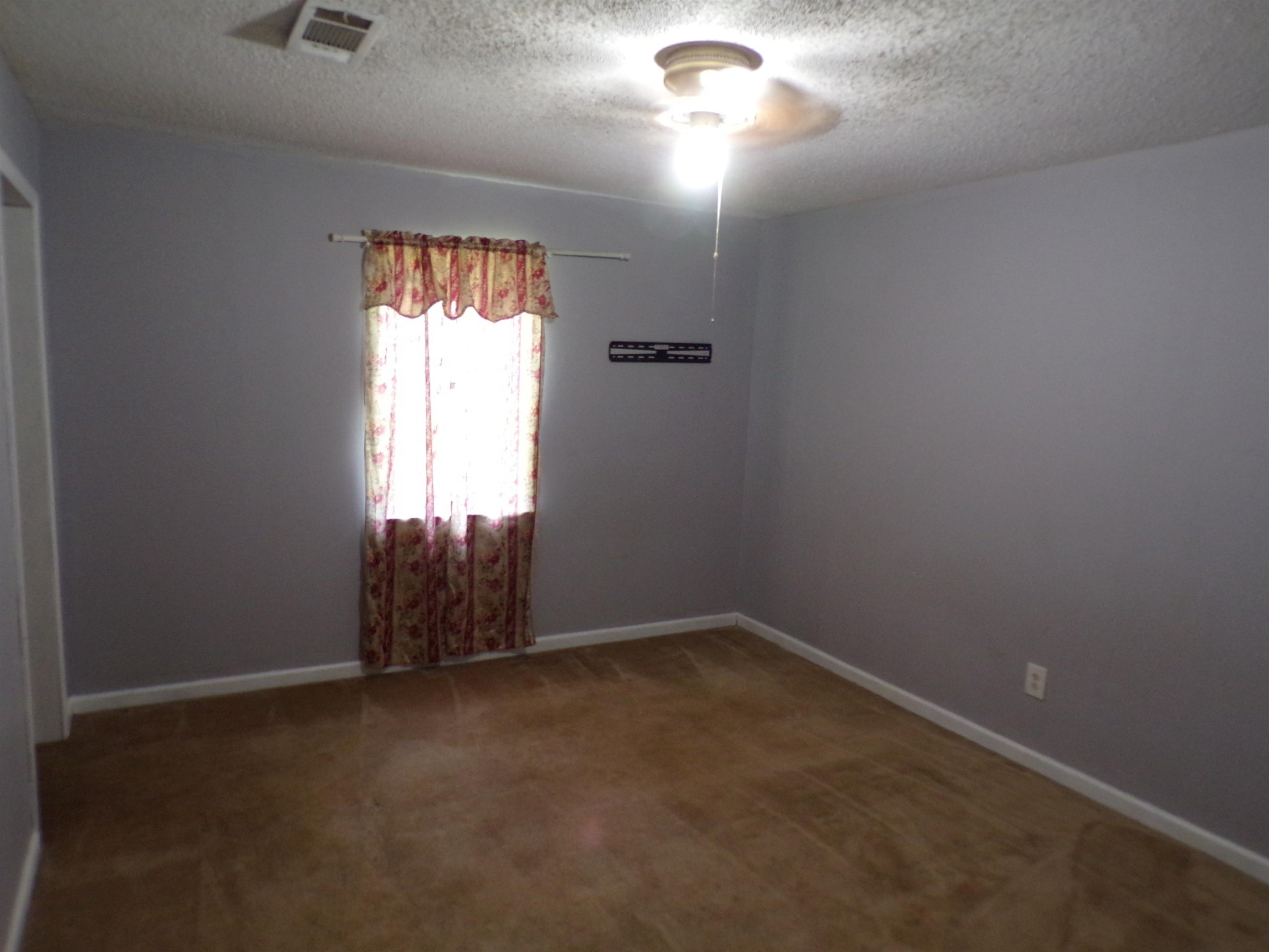 75 Friends Road Potts Camp, MS 38659 - Photo 21 of 28 an empty room with a window