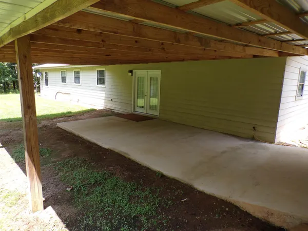 a view of a backyard of the house