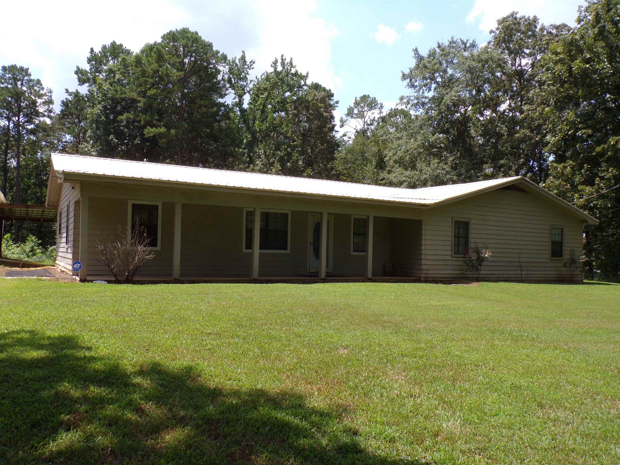 75 Friends Road Potts Camp, MS 38659 - Photo 3 of 28 a front view of house with yard and green space