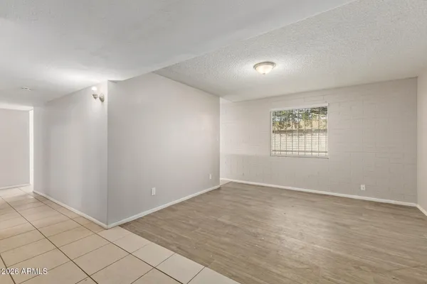 a kitchen with stainless steel appliances granite countertop a refrigerator sink and cabinets