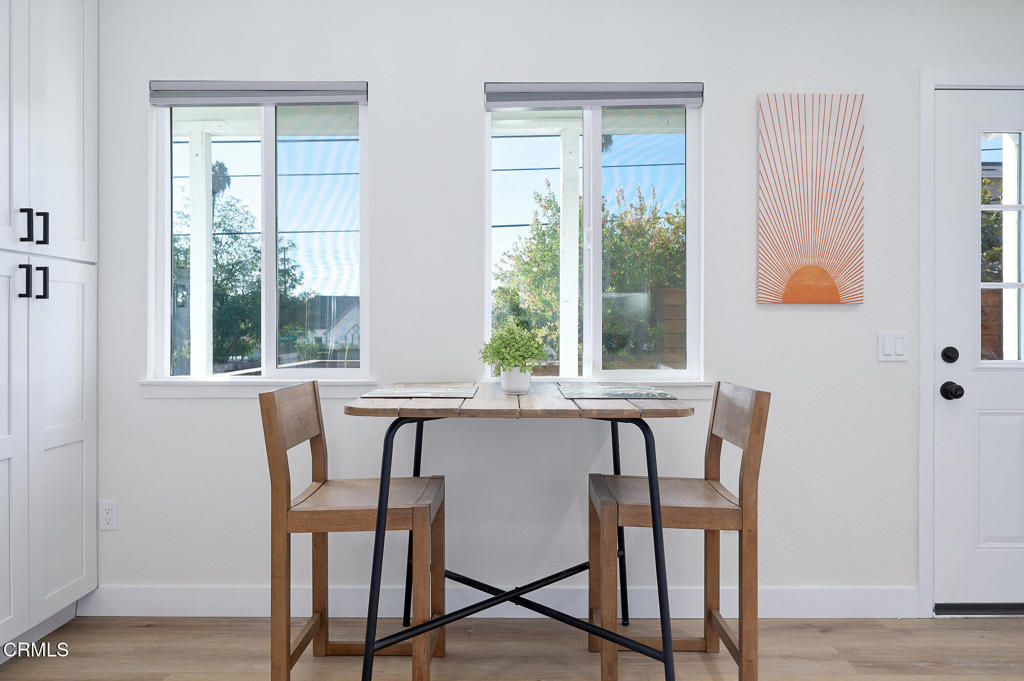 97 Everett Street, Unit B Moorpark, CA 93021 - Photo 15 of 28 a view of a dining room with furniture and window