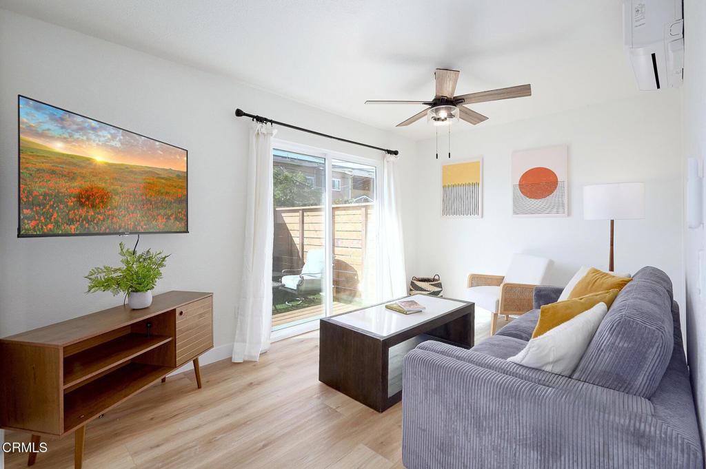 97 Everett Street, Unit B Moorpark, CA 93021 - Photo 17 of 28 a living room with furniture ceiling fan and a window