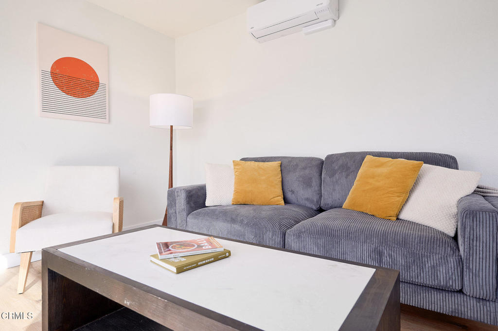 97 Everett Street, Unit B Moorpark, CA 93021 - Photo 18 of 28 a living room with furniture and a lamp