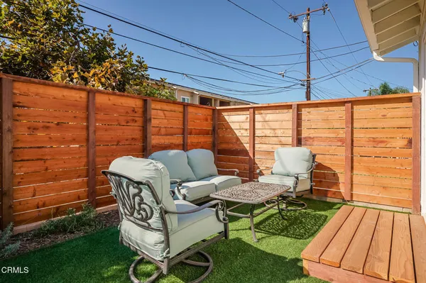 a view of a outdoor seating area with furniture