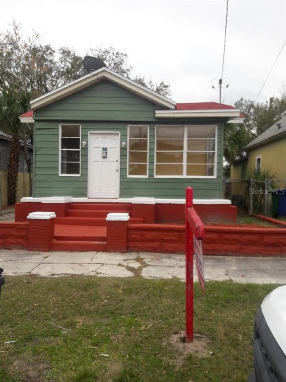 1924 West Cherry Street Tampa, FL 33607 - Photo 1 of 1 a front view of a house with a yard