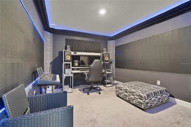 a bedroom with a bed and a chair