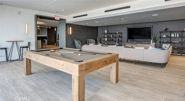 a view of a patio with couches chairs dining table and chairs