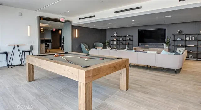 a view of a patio with couches chairs dining table and chairs