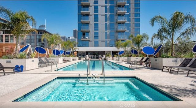 a room with gym equipment and windows