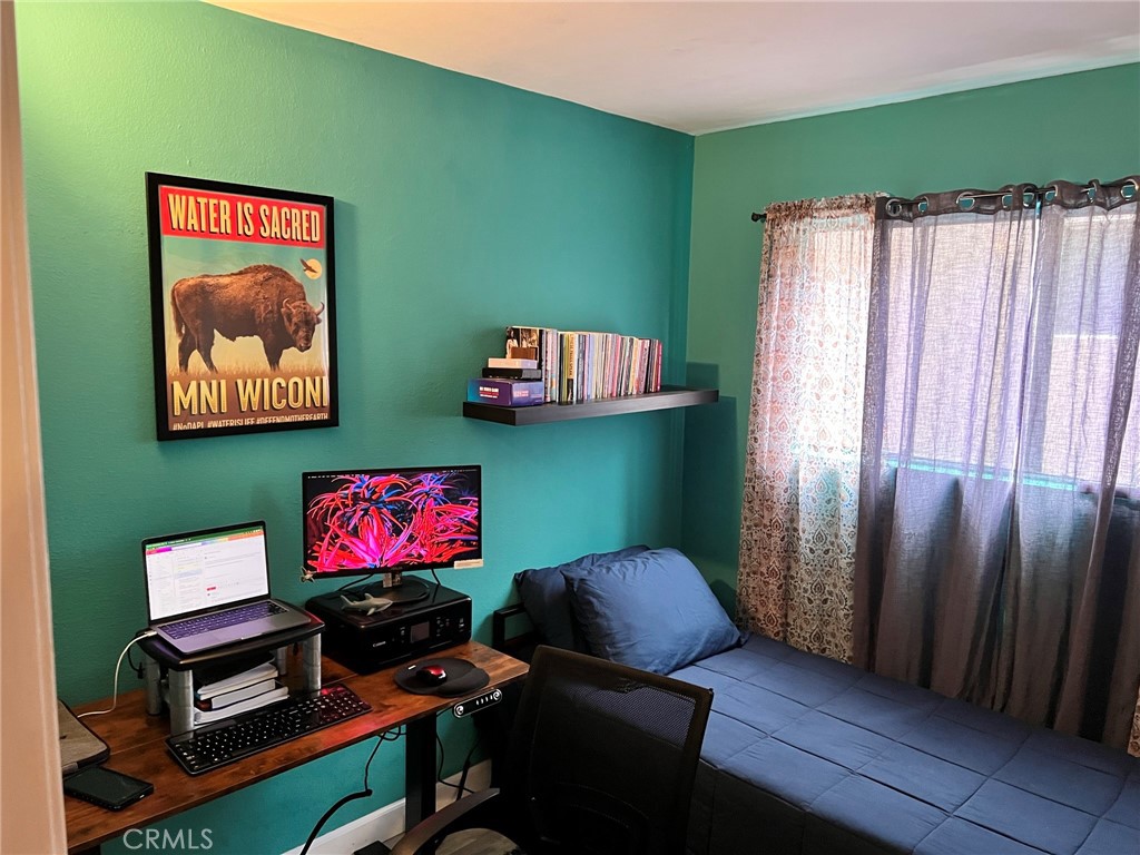 1723 Cedar Avenue, Unit 102 Long Beach, CA 90813 - Photo 13 of 22 a view of a room with furniture and a window