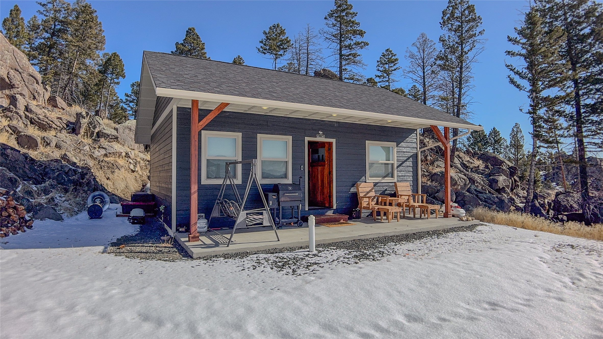 55 Whiskey Gulch Road Whitehall, MT 59759 - Photo 1 of 1 View of front of property with covered porch and a shingled roof