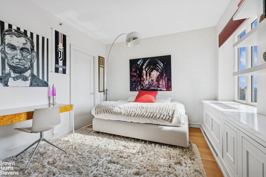 1280 5th Avenue, Unit 19C Manhattan, NY 10029 - Photo 11 of 20 a bedroom with a bed and dresser