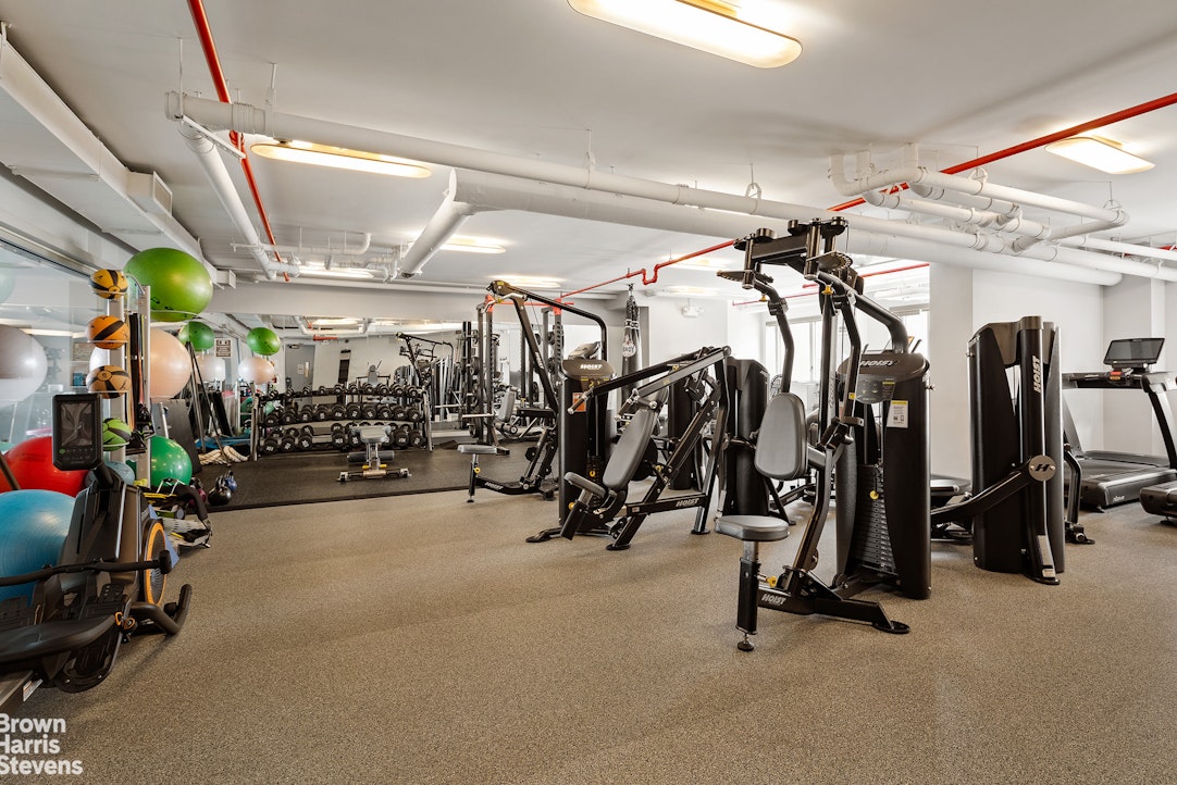 1280 5th Avenue, Unit 19C Manhattan, NY 10029 - Photo 13 of 20 a view of a room with gym equipment