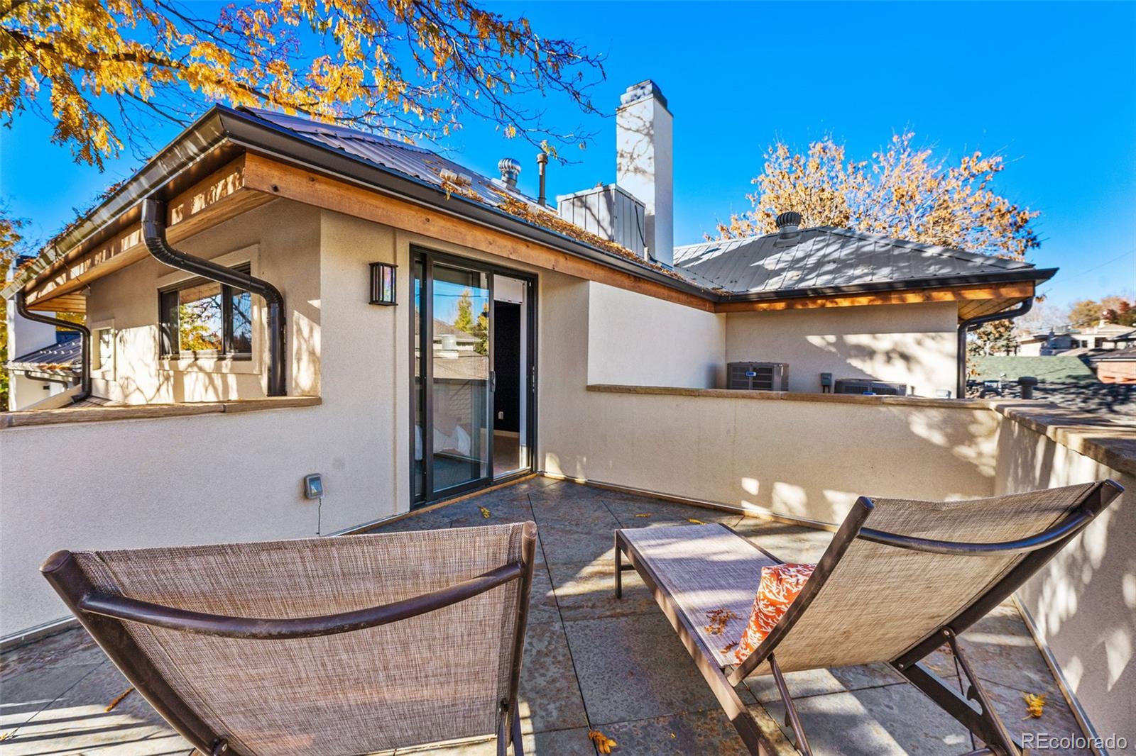 422 Cook Street Denver, CO 80206 - Photo 31 of 40 a view of house with outdoor seating space