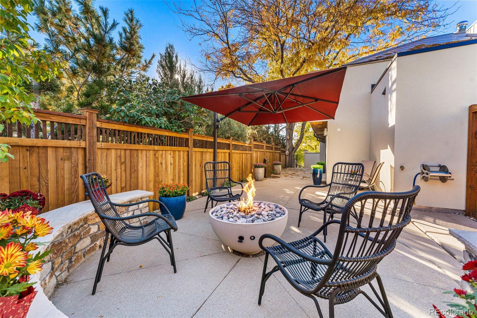 422 Cook Street Denver, CO 80206 - Photo 39 of 40 a view of a patio with a table and chairs