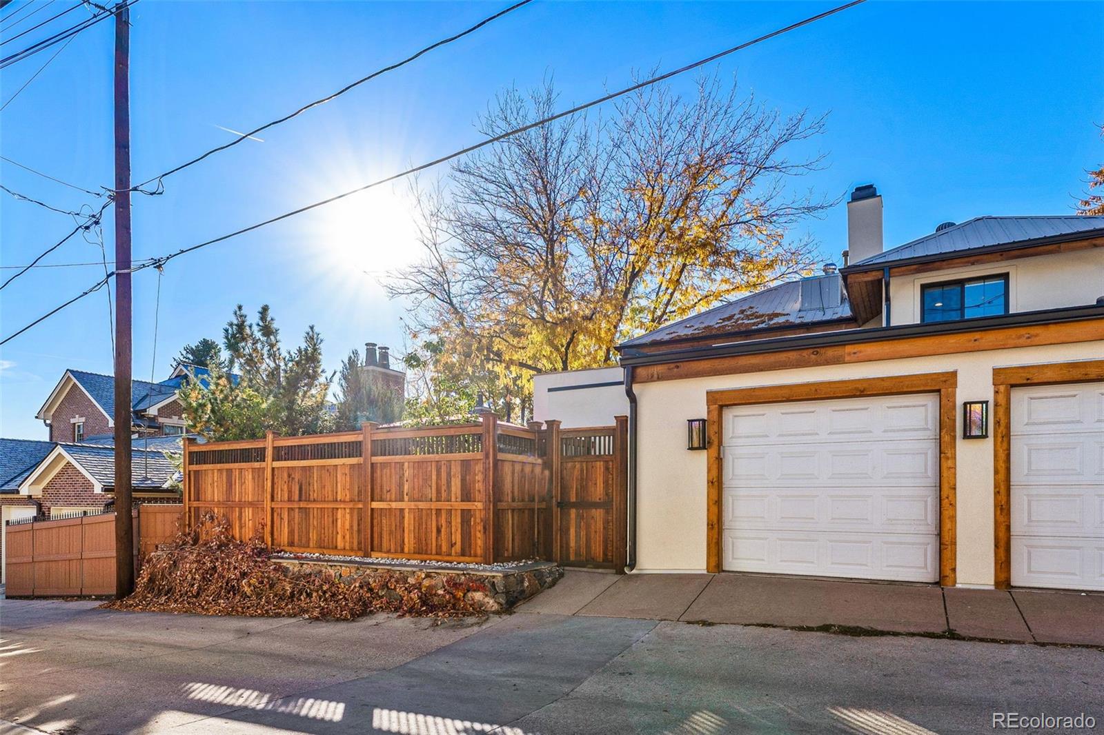 422 Cook Street Denver, CO 80206 - Photo 40 of 40 a view of a house with a garage