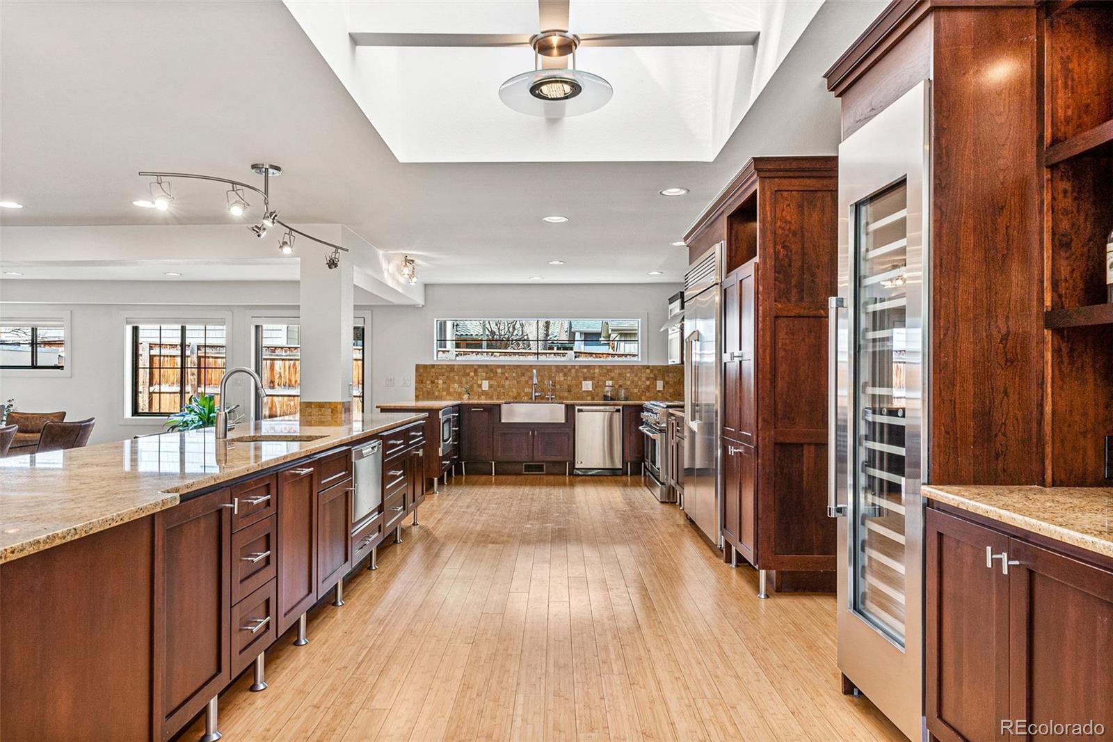 422 Cook Street Denver, CO 80206 - Photo 9 of 40 a view of a kitchen with lots of counter top space