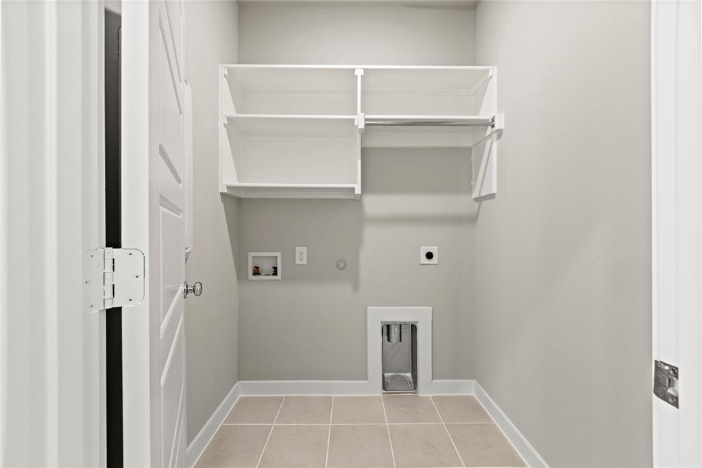 4005 High Valley McKinney, TX 75071 - Photo 15 of 18 a view of walk in closet with empty racks