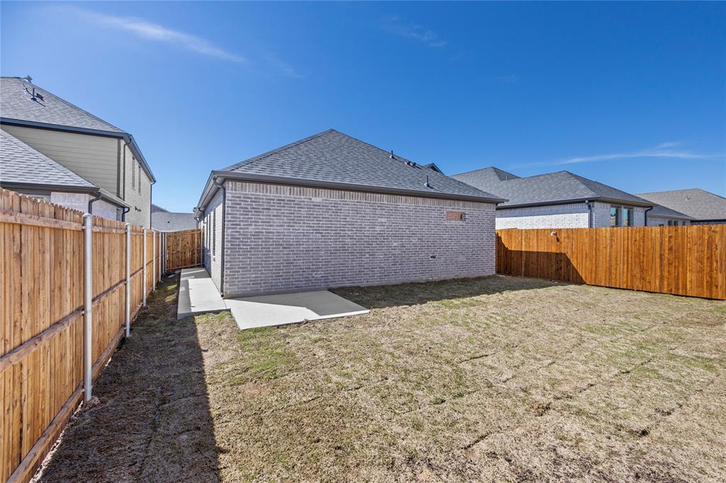 4005 High Valley McKinney, TX 75071 - Photo 18 of 18 a view of a house with wooden fence