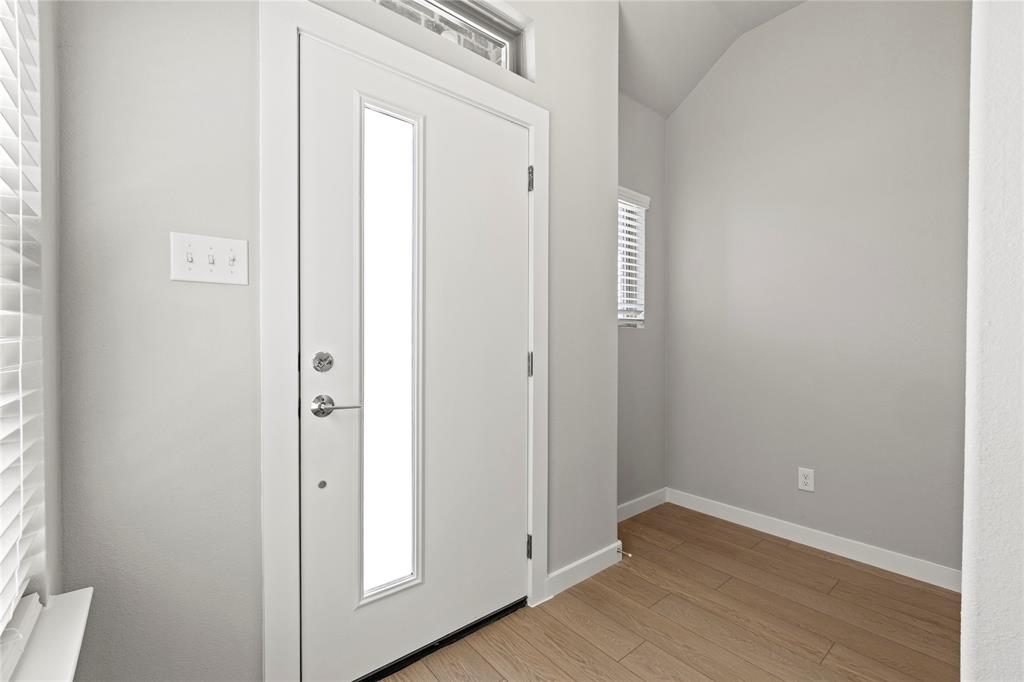 4005 High Valley McKinney, TX 75071 - Photo 2 of 18 a view of an entryway with wooden floor