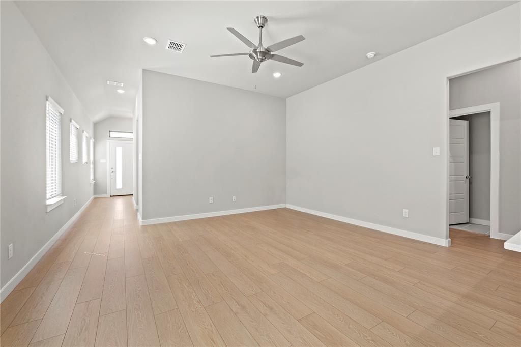 4005 High Valley McKinney, TX 75071 - Photo 4 of 18 wooden floor in an empty room with a window