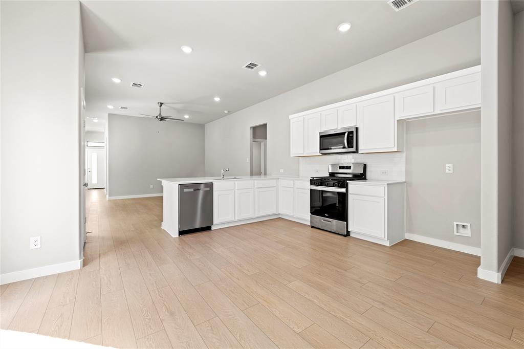4005 High Valley McKinney, TX 75071 - Photo 6 of 18 a view of kitchen with wooden floor