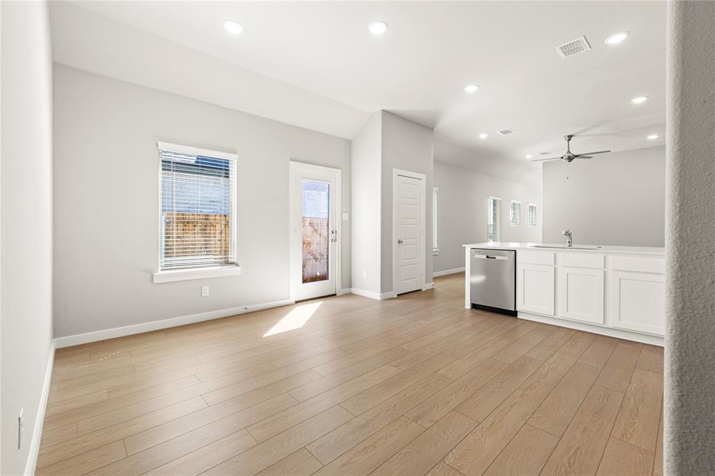 4005 High Valley McKinney, TX 75071 - Photo 7 of 18 a view of an empty room with window and wooden floor