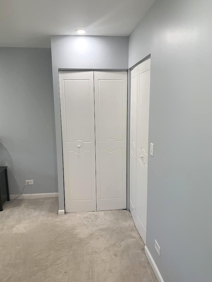 810 North River Road, Unit 3C Mount Prospect, IL 60056 - Photo 15 of 21 an empty room with an entryway