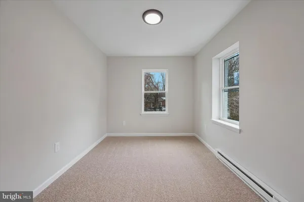 an empty room with windows