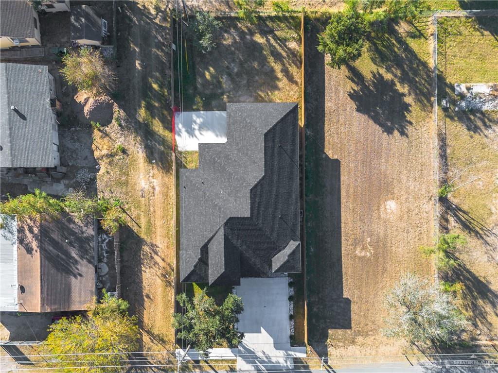 607 North 9th Street Alamo, TX 78516 - Photo 21 of 24 a view of a house with a yard