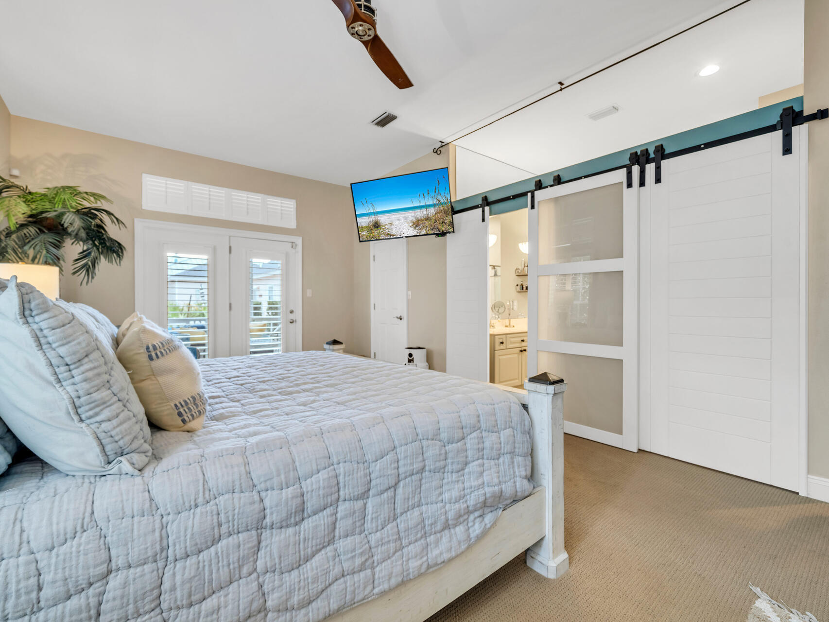 4497 Clipper Cove Destin, FL 32541 - Photo 21 of 44 a bedroom with a bed and a window