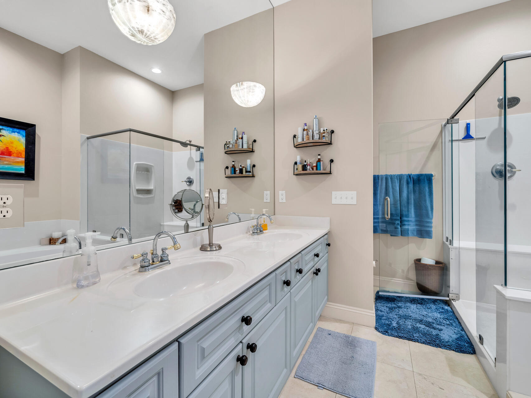 4497 Clipper Cove Destin, FL 32541 - Photo 22 of 44 a spacious bathroom with a sink double vanity granite and a mirror