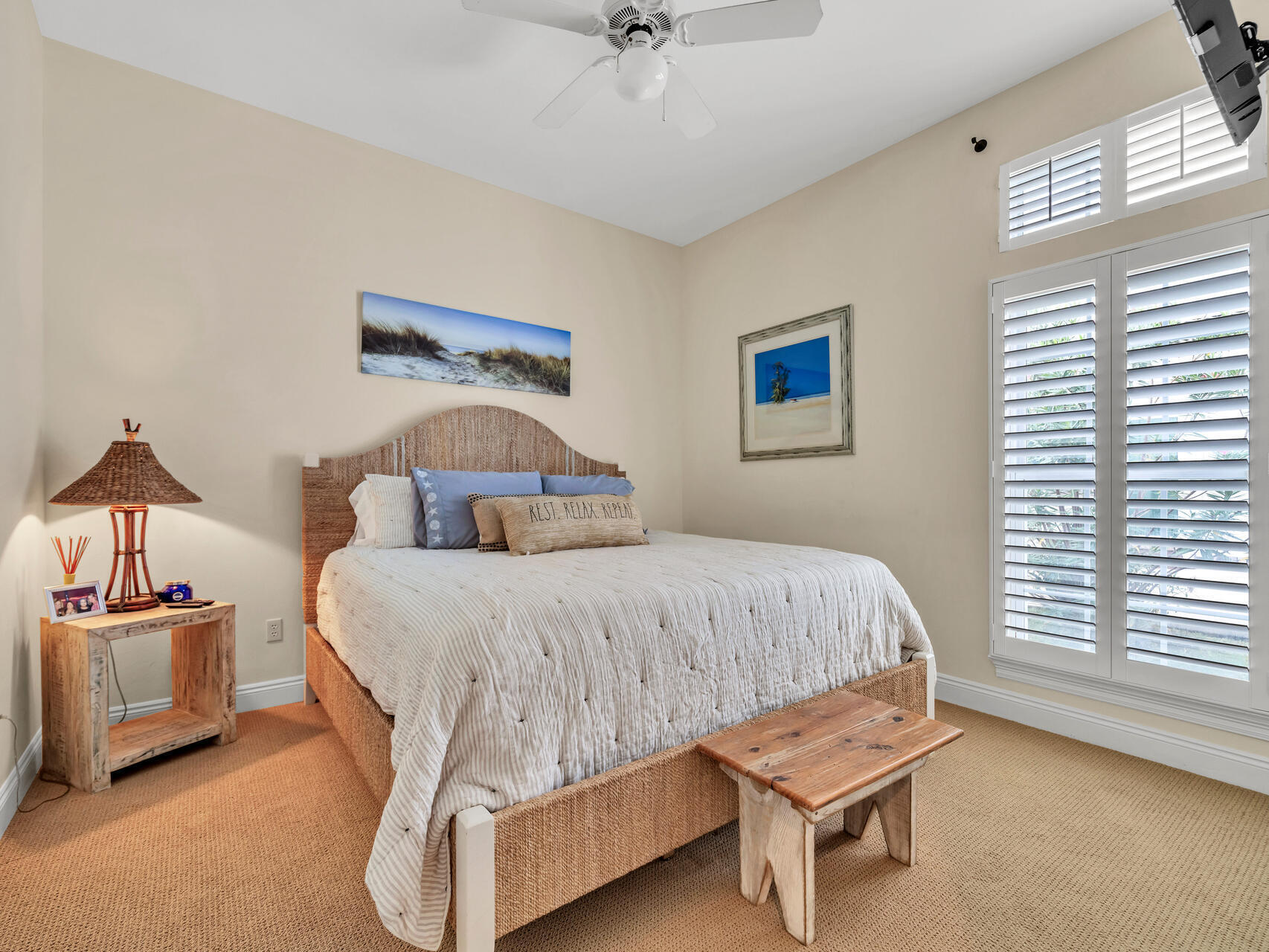 4497 Clipper Cove Destin, FL 32541 - Photo 27 of 44 a bedroom with a bed and a window