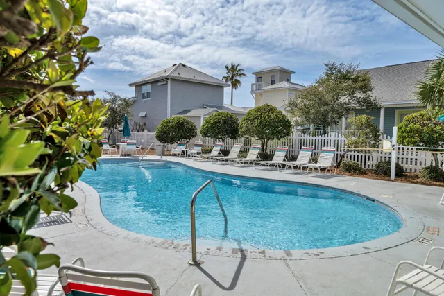 a view of a swimming pool with a patio