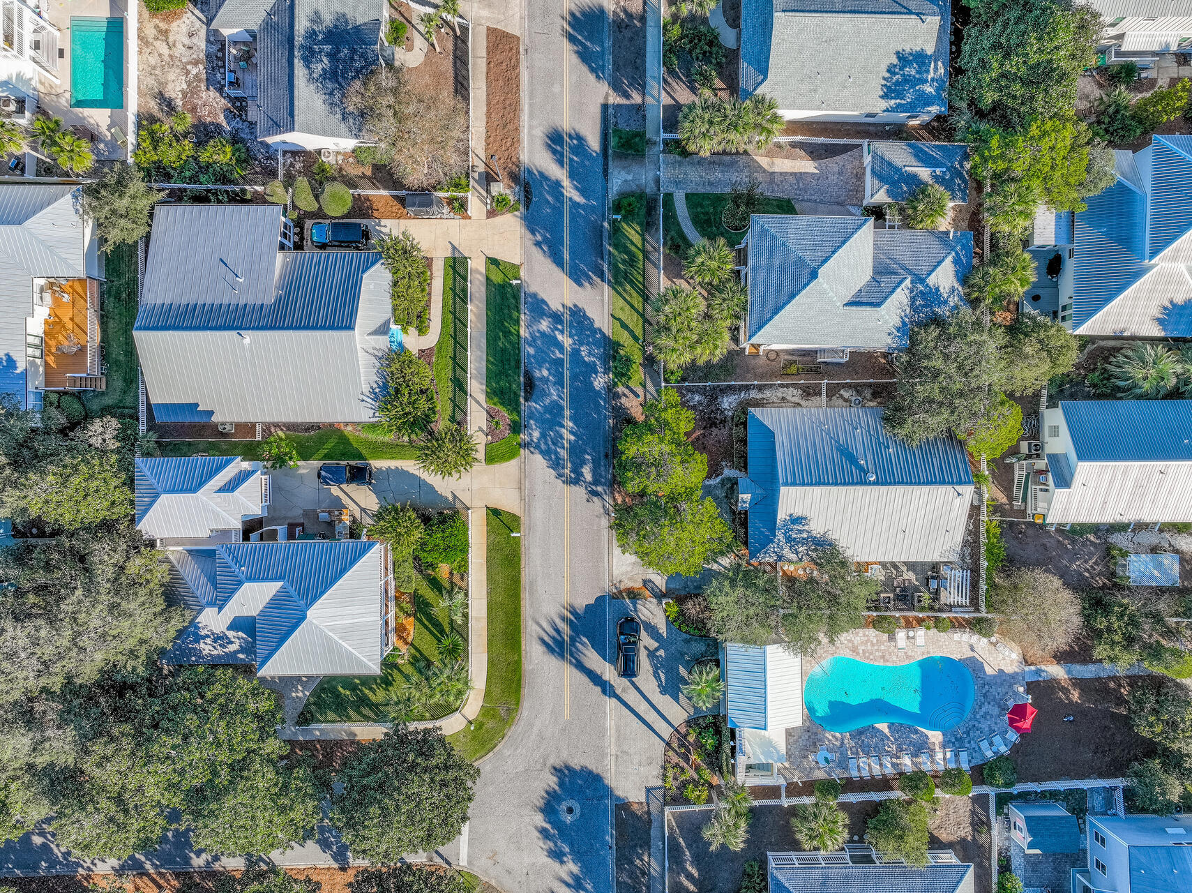4497 Clipper Cove Destin, FL 32541 - Photo 44 of 44 an aerial view of a houses with yard