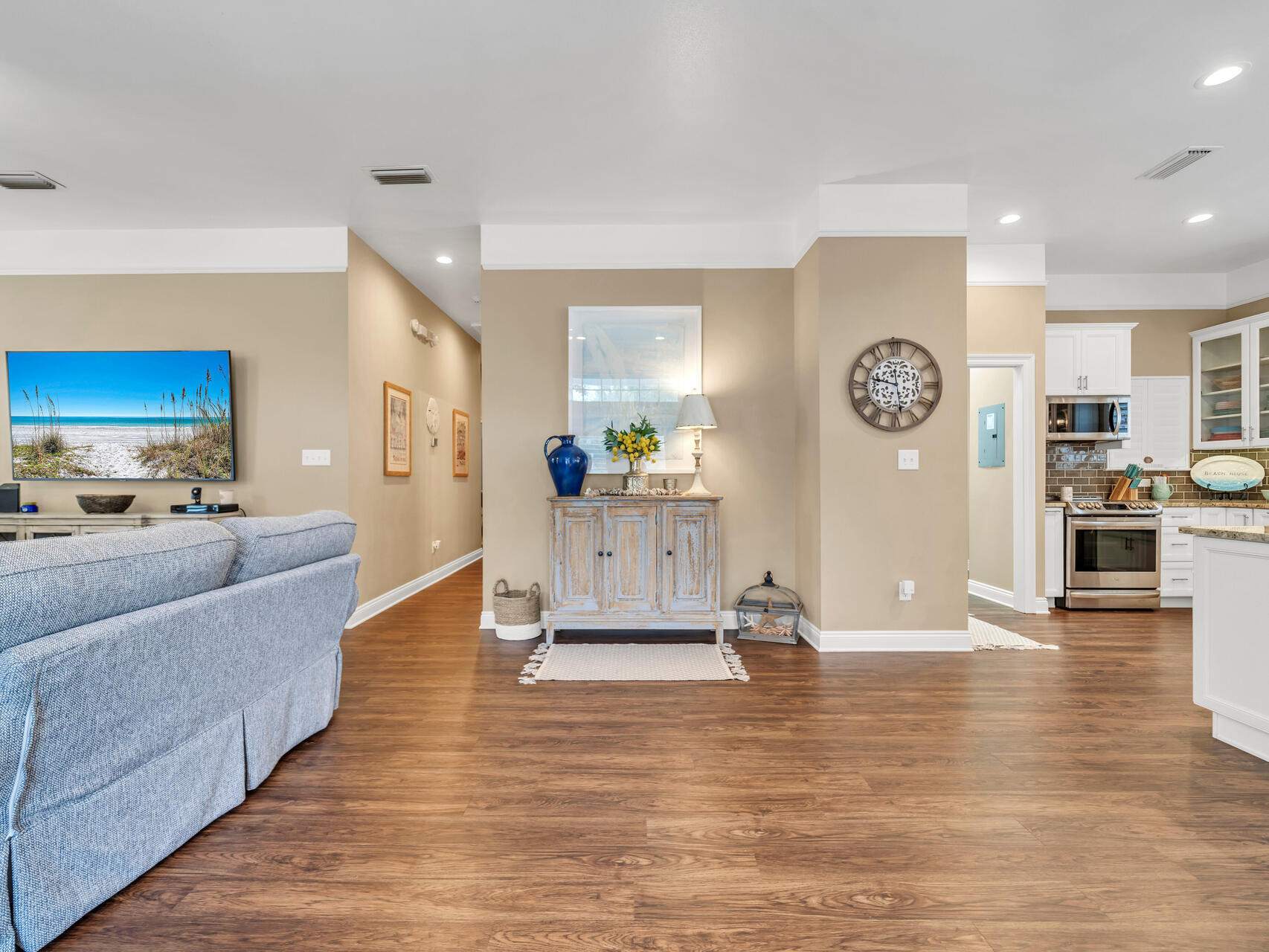 4497 Clipper Cove Destin, FL 32541 - Photo 10 of 44 a living room with furniture and kitchen view