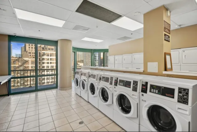 a view of a kitchen with washer and dryer