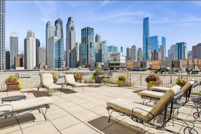 a view of a city with tall buildings