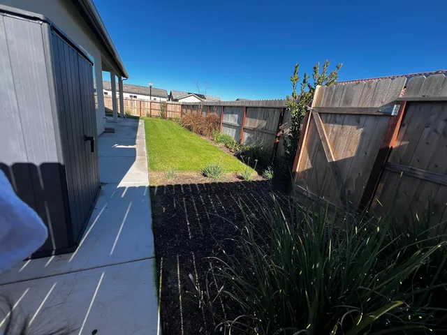 a view of balcony with furniture