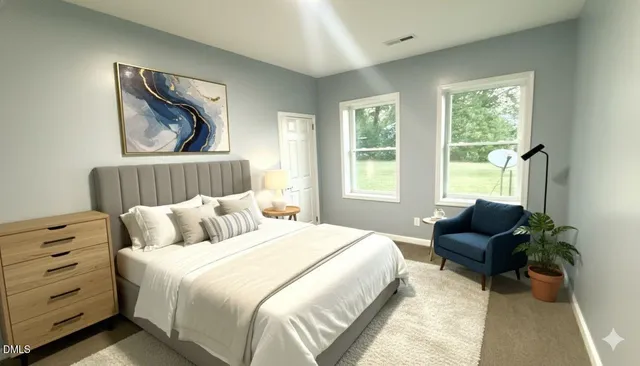 a bedroom with a bed and a couch