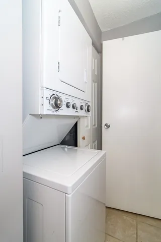 a utility room with washer and dryer
