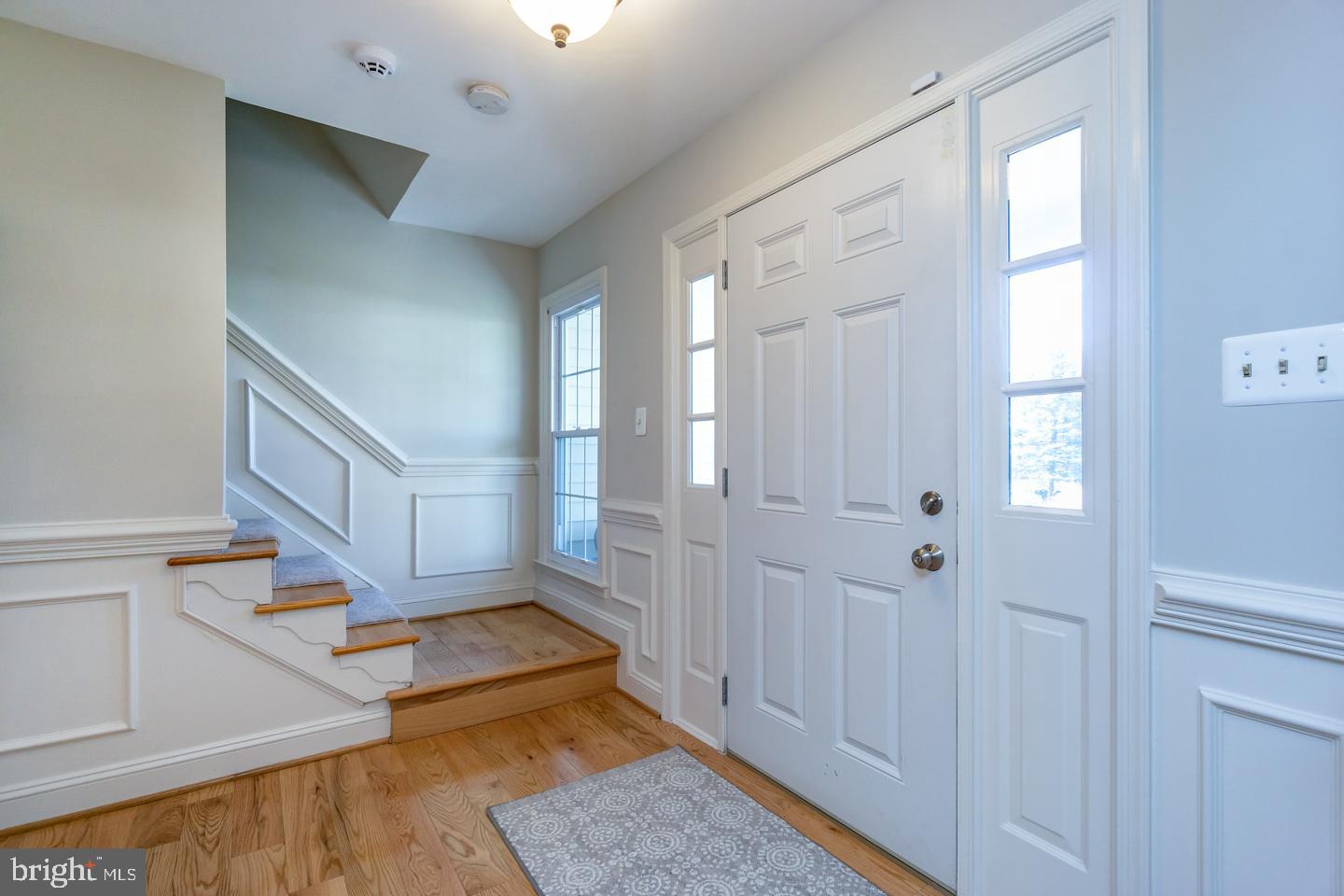 13351 Point Rider Lane Herndon, VA 20171 - Photo 2 of 39 Foyer with elegant wainscoting