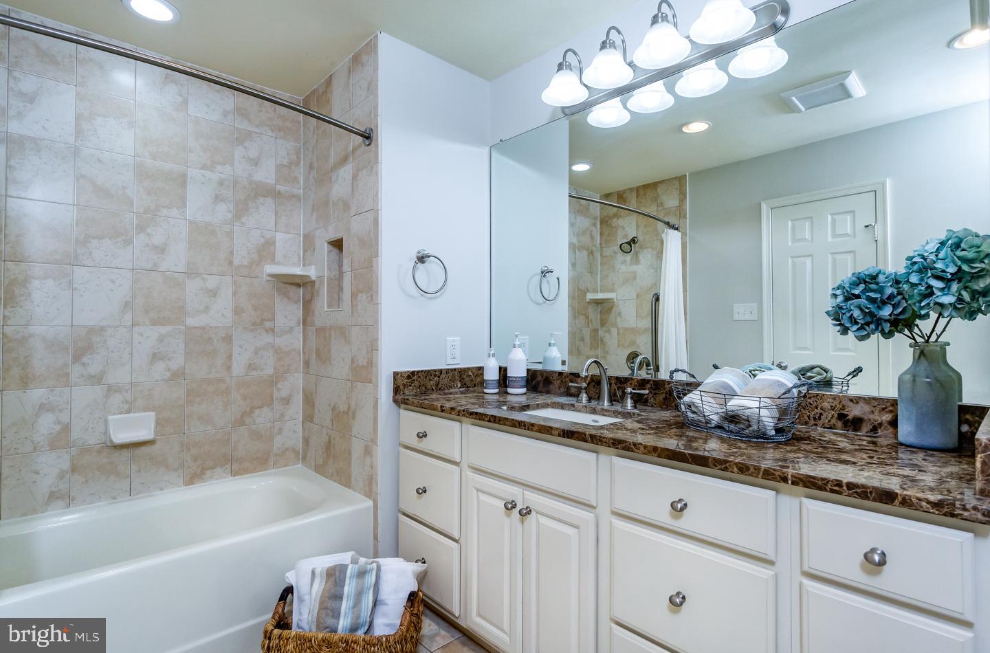 13351 Point Rider Lane Herndon, VA 20171 - Photo 24 of 39 Owner's bathroom with premium counter and tile