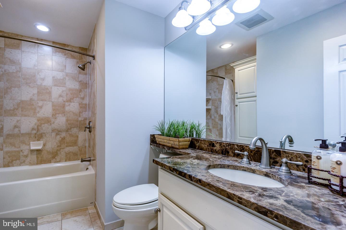 13351 Point Rider Lane Herndon, VA 20171 - Photo 28 of 39 Hall bath with premium tile and counter