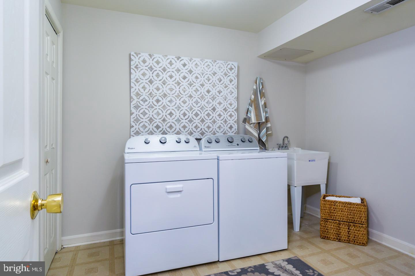 13351 Point Rider Lane Herndon, VA 20171 - Photo 30 of 39 Laundry room w/walk-in storage closet, new sink