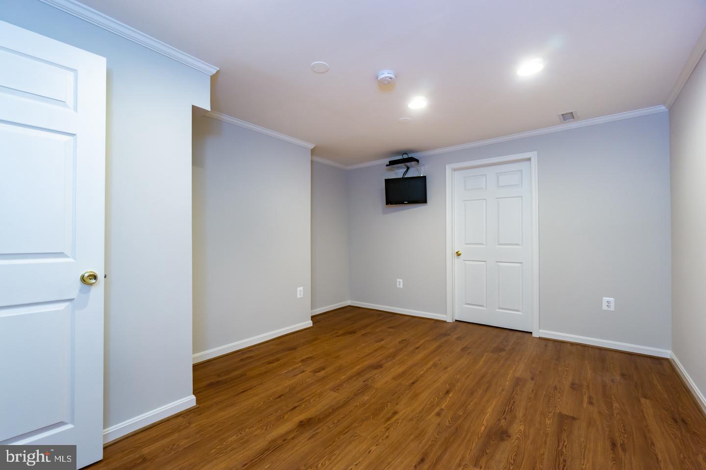 13351 Point Rider Lane Herndon, VA 20171 - Photo 32 of 39 Lower level room with upgraded vinyl plank floor