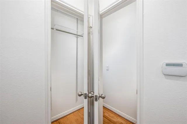 a view of storage and utility room with washer and dryer