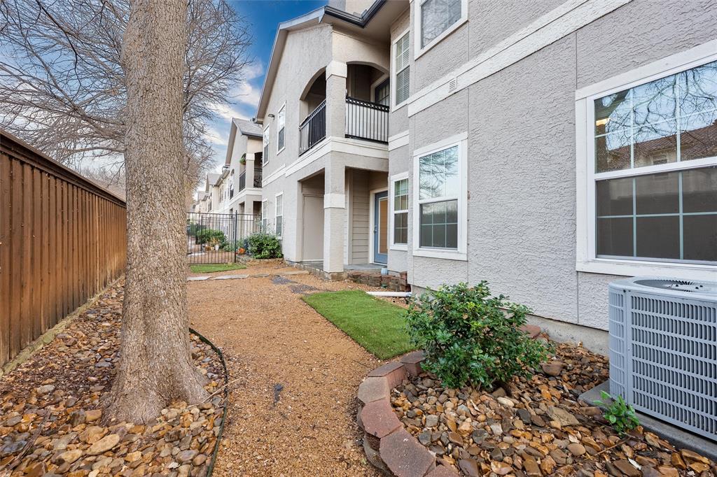 2601 Preston Road, Unit 6108 Plano, TX 75093 - Photo 25 of 26 a house view with a garden space