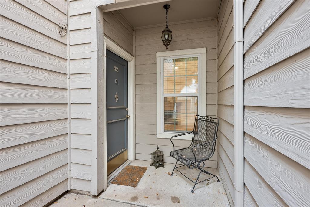 2601 Preston Road, Unit 6108 Plano, TX 75093 - Photo 3 of 26 a patio with table and chairs and potted plants
