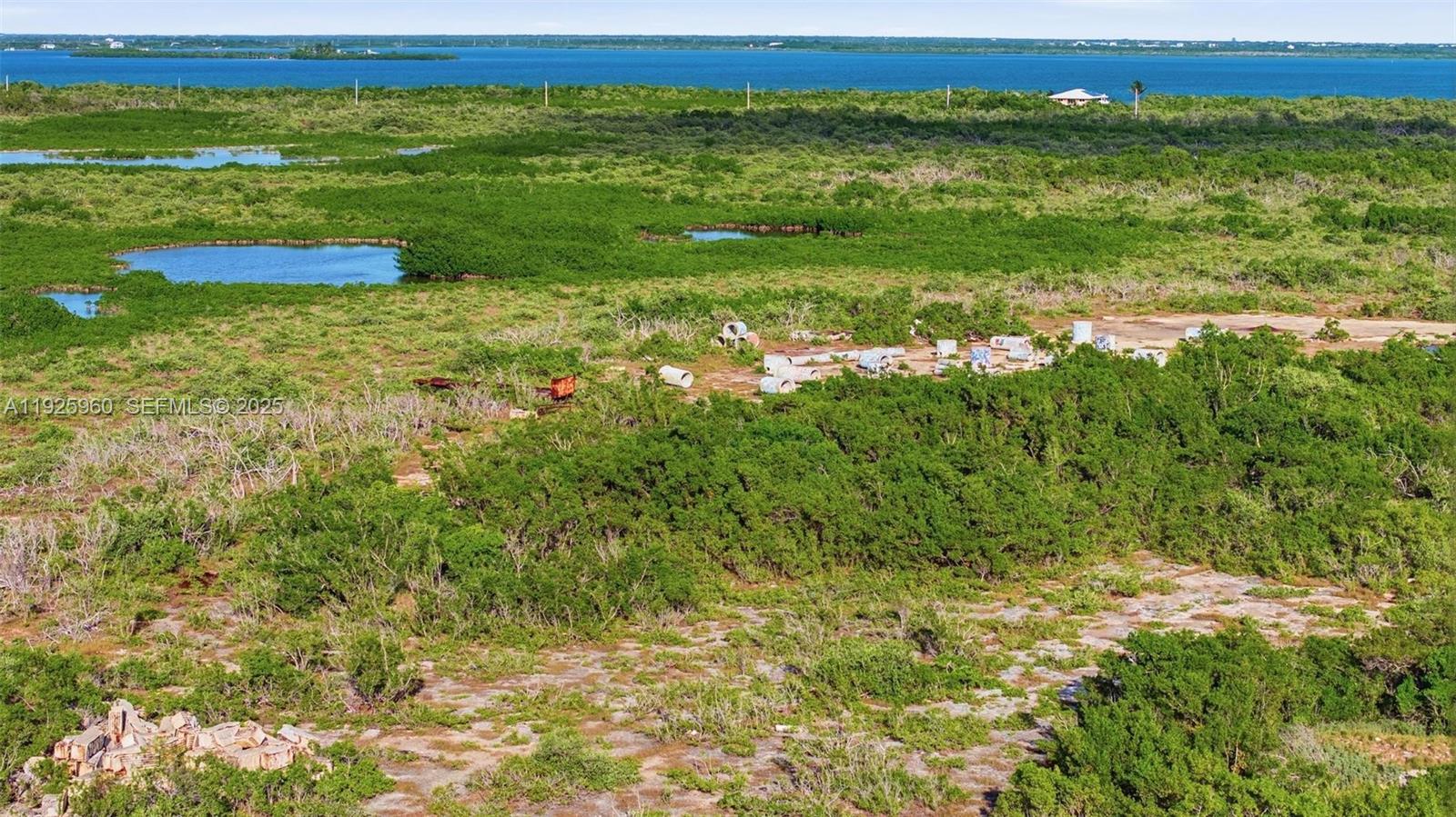 0 Niles Road Summerland Key, FL 33042 - Photo 28 of 36 a view of a field with an ocean